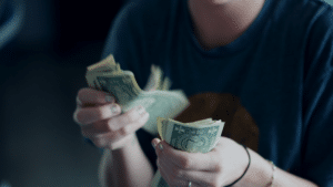 woman counting money
